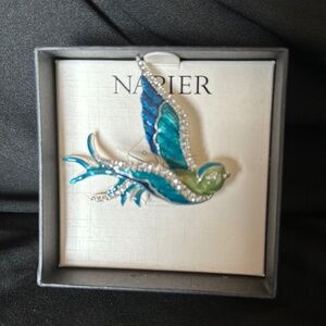 Vintage Napier bird pin.